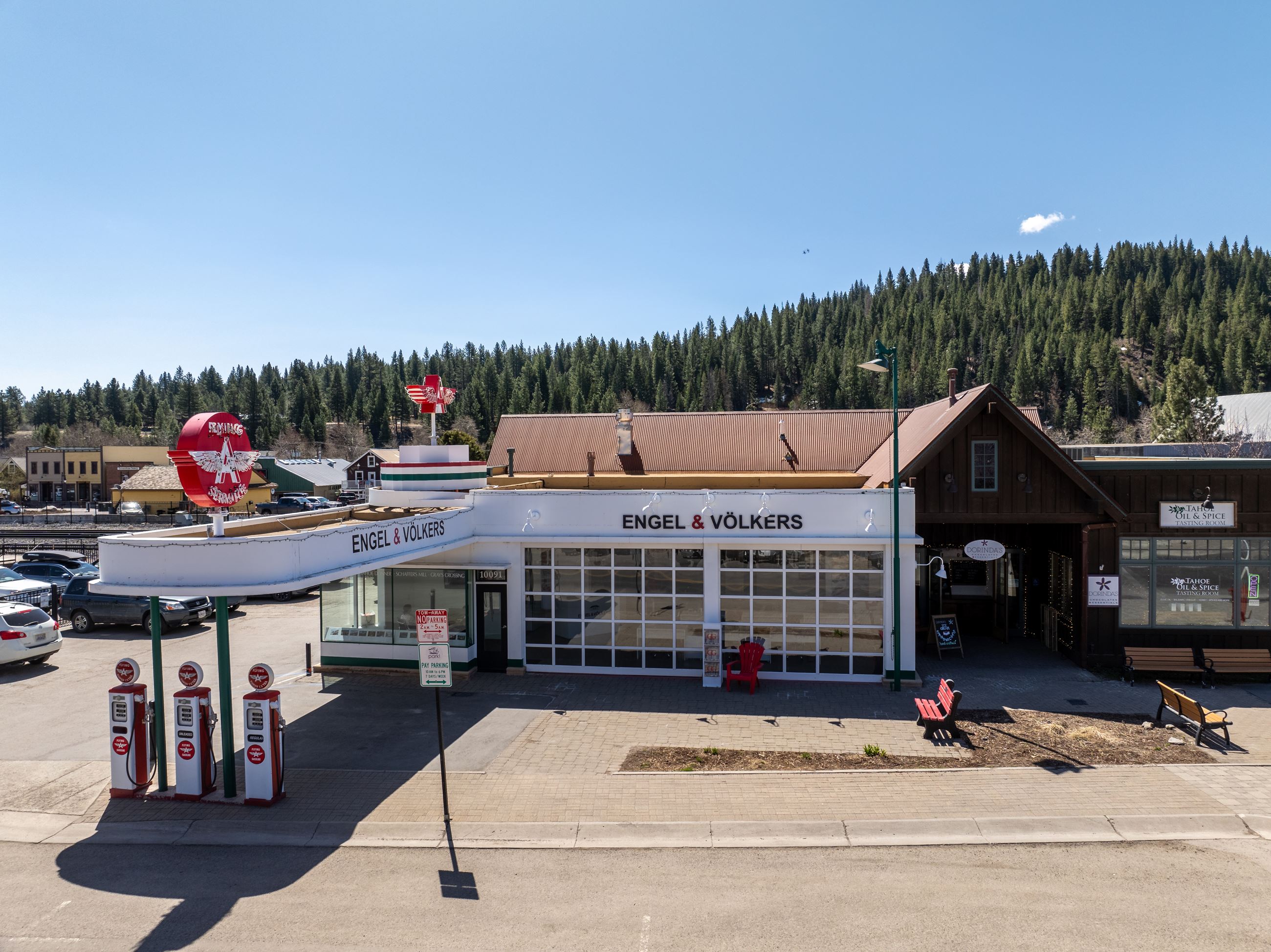 Photo of a building in Downtown Truckee that has been restored with large red flying A logo. 