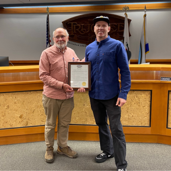 Mayor Zabriskie and representative from Truckee Dirt Union accepting an award in Council Chambers